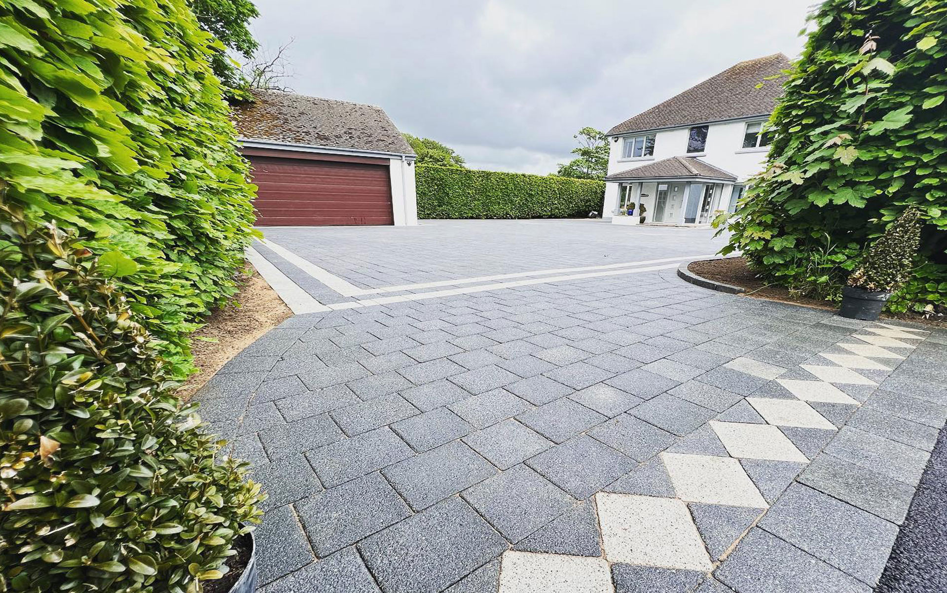 Grey granite effect block paved driveway